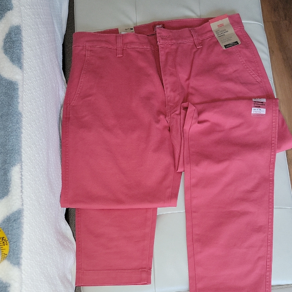 LEVI'S.  red Tapered Leg Jeans
